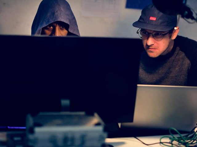 hacker-hacking-stealing-password-on-the-internet-PMG637D